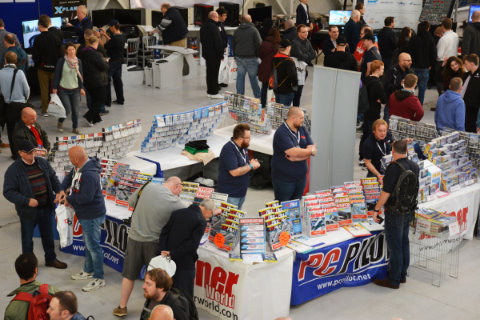 Zoomed in shot of the PC Pilot stand and visitors in the main exhibition area