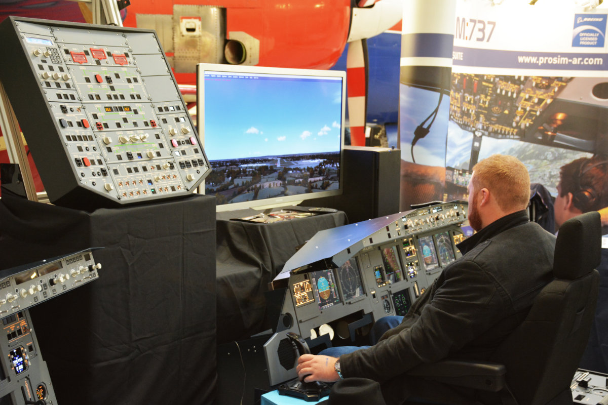 A visitor tries out some serious Flight Sim hardware from SKALARKI electronics