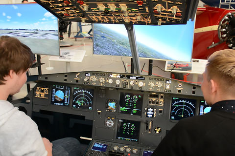 Visitors checking out cockpit hardware