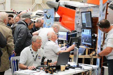 Visitors at one of the many community stands