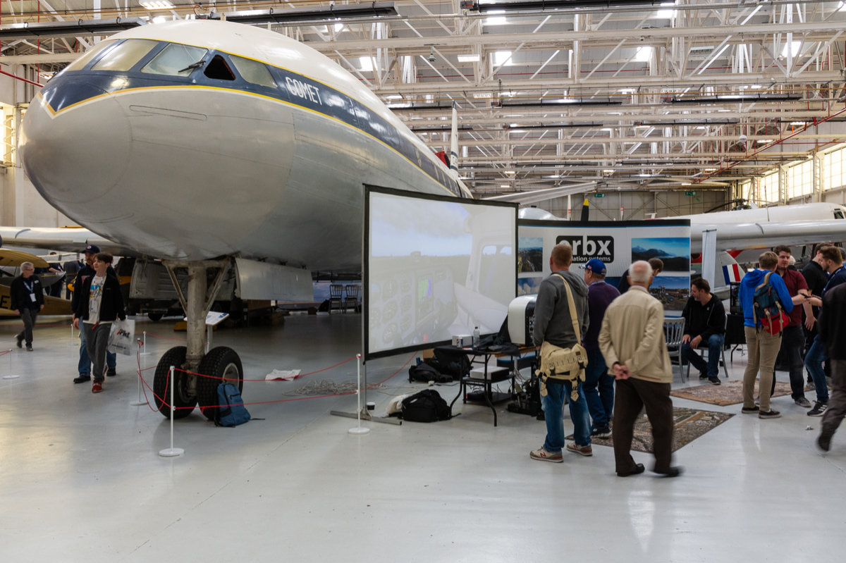 The Orbx stand nestled up again the Comet