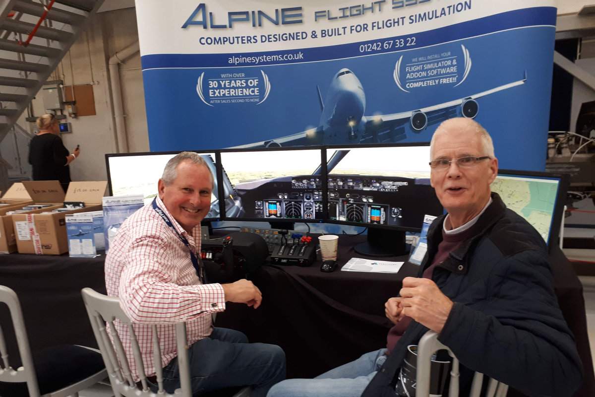 Visitors enjoying the display at the Alpine stand