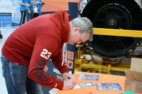 Visitor entering a competition at the FSElite stand