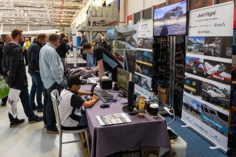 Demonstrating various products at the Just Flight stand